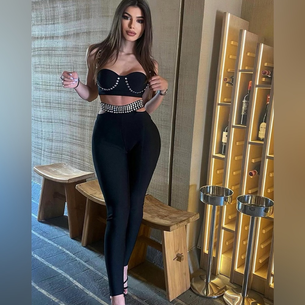 Fashion Nova stud at the club pants black with built in rhinestone belt